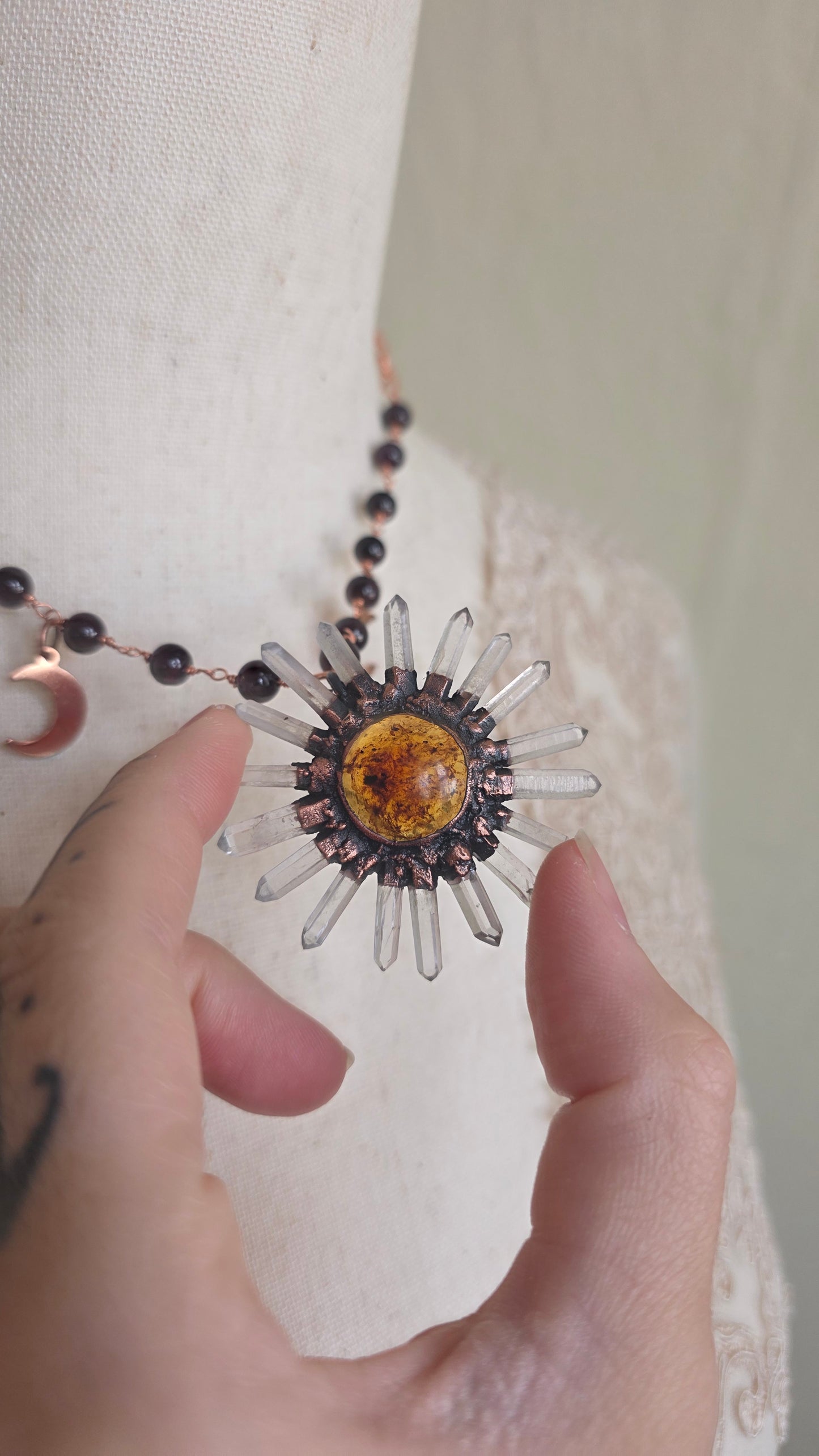 Lucia: Amber and Quartz Copper Sun with Garnet Pendant