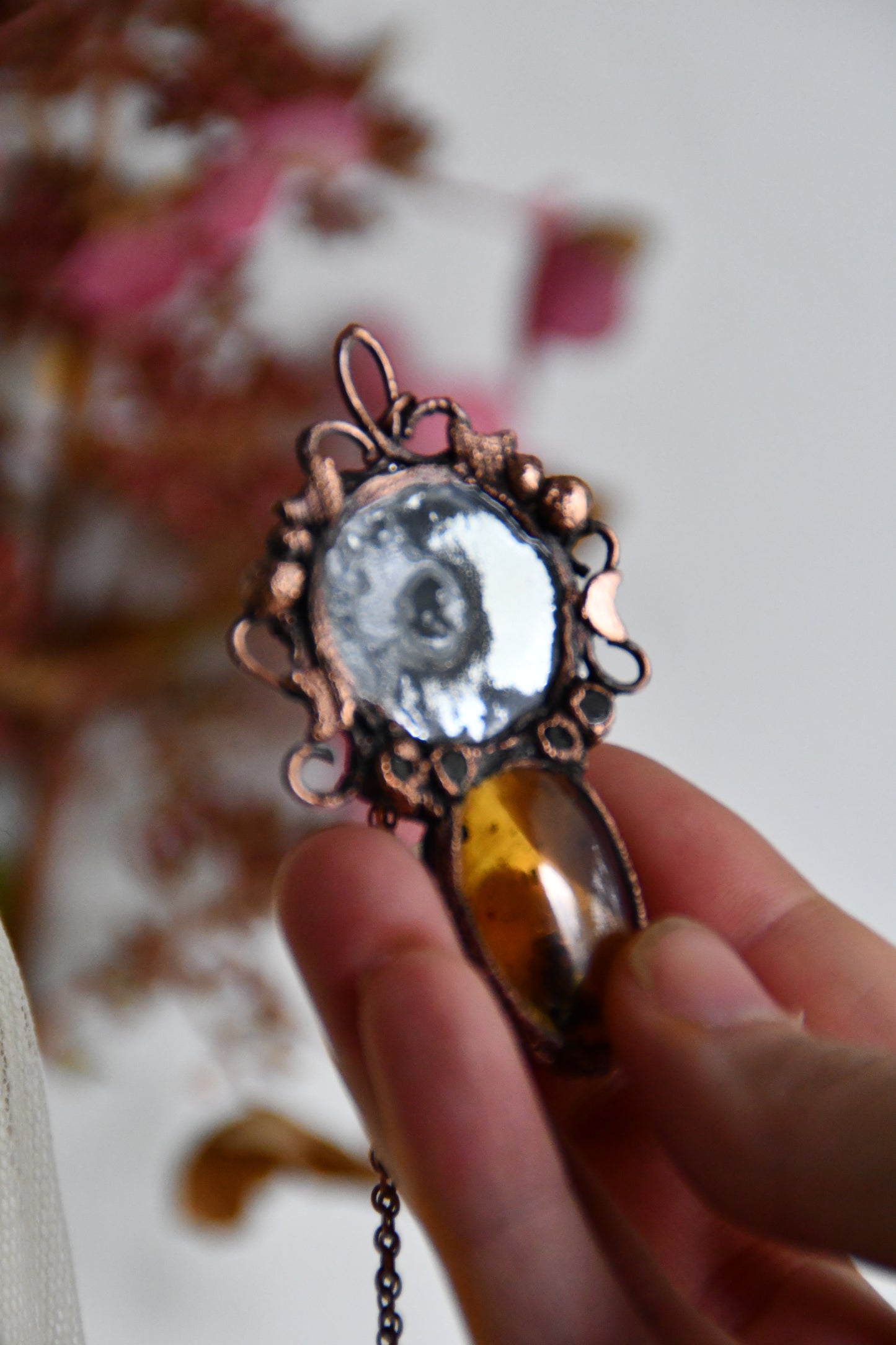 Ritual: The Story Weaver Mirror Pendant with Insect Amber and Garnet