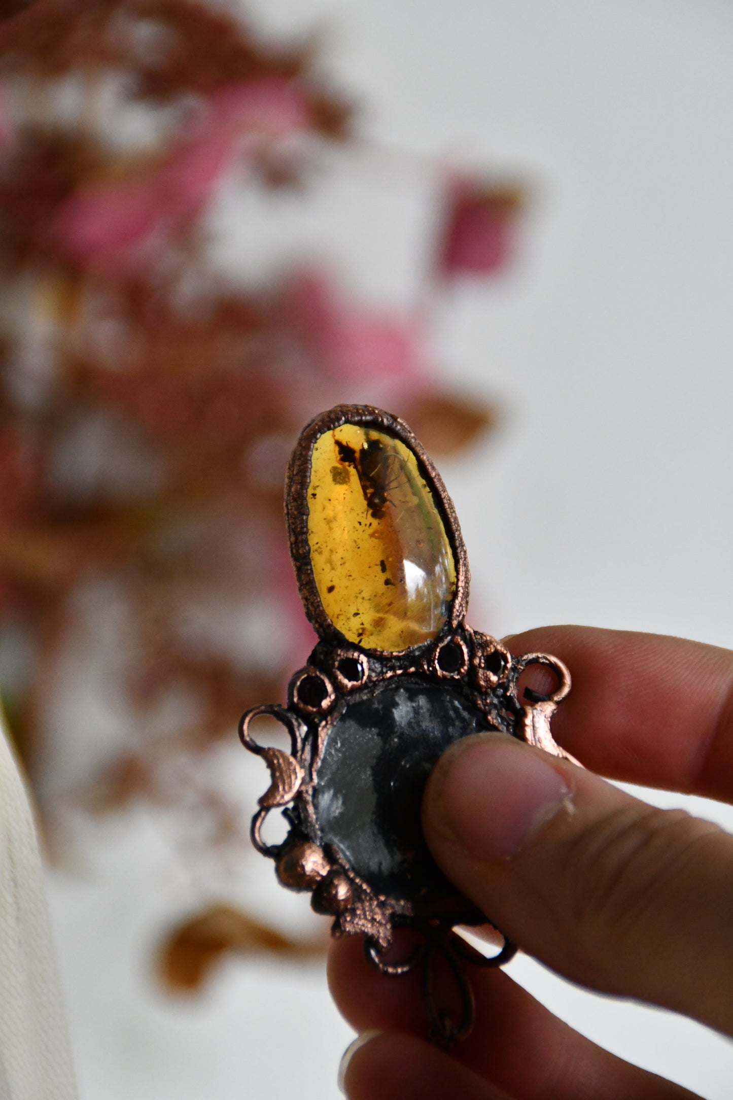 Ritual: The Story Weaver Mirror Pendant with Insect Amber and Garnet