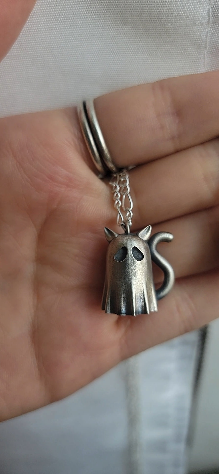 Solid cast sheet ghost kitty necklace