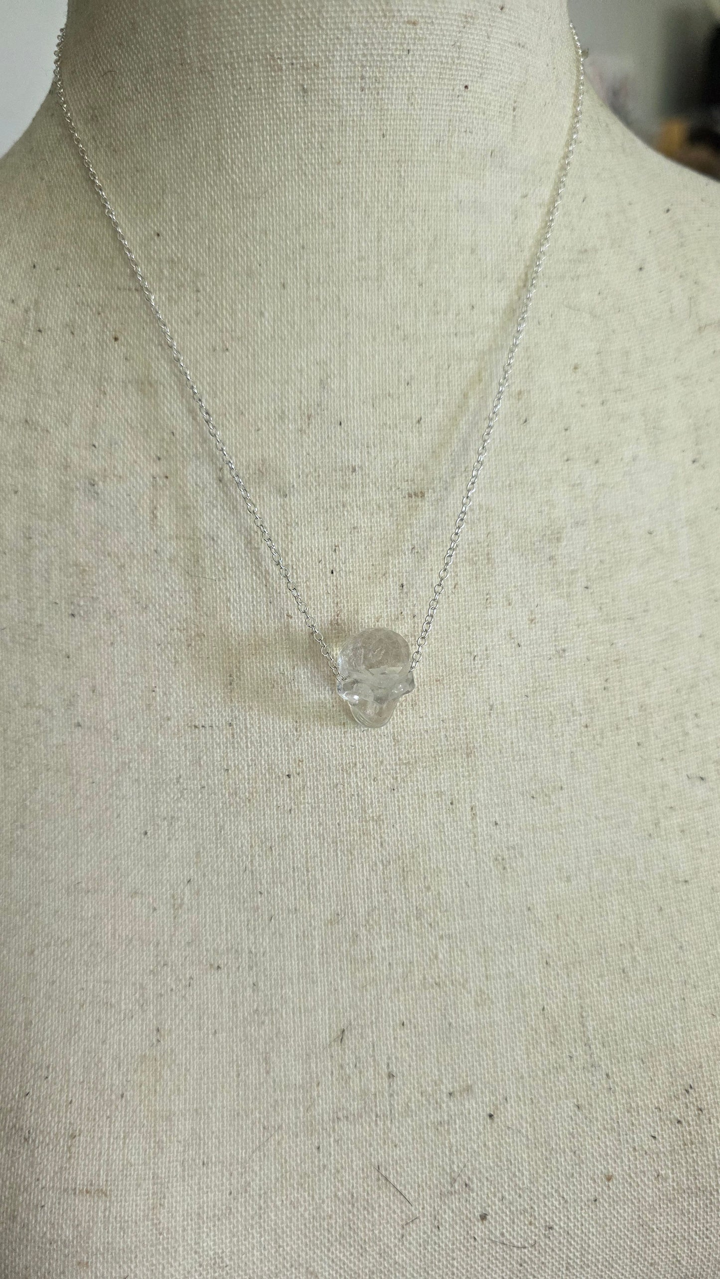 Faceted quartz skull bead necklace