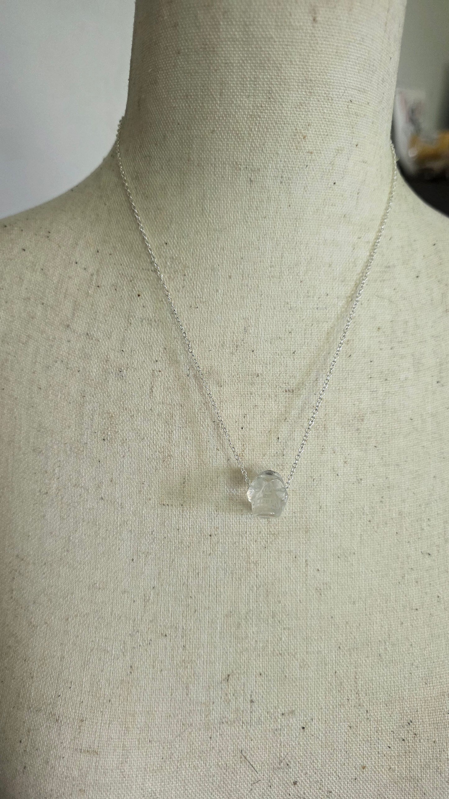 Faceted quartz skull bead necklace