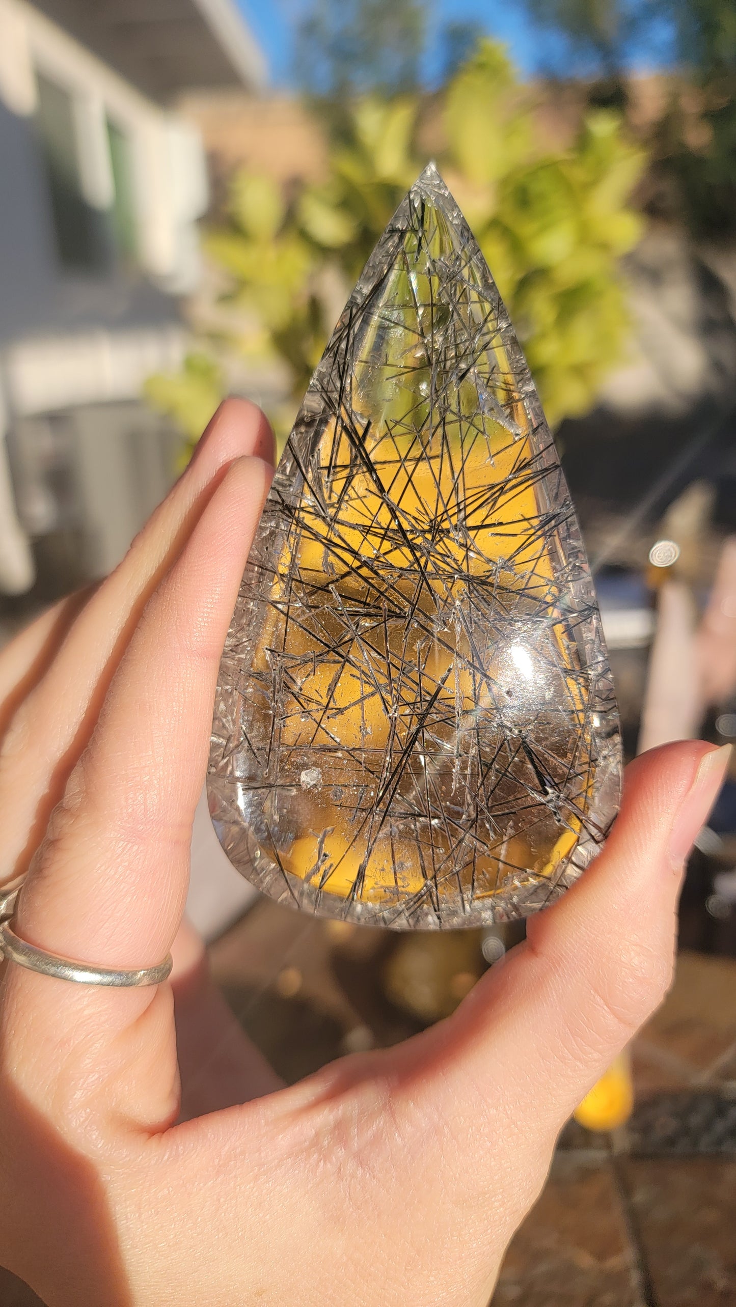 Giant tourmalinated quartz cabochon