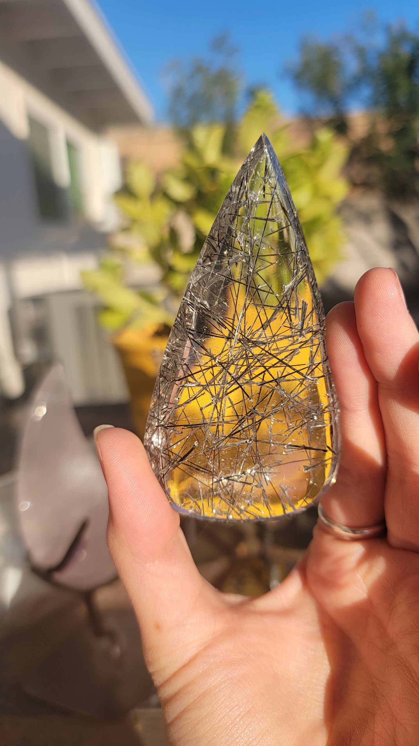 Giant tourmalinated quartz cabochon