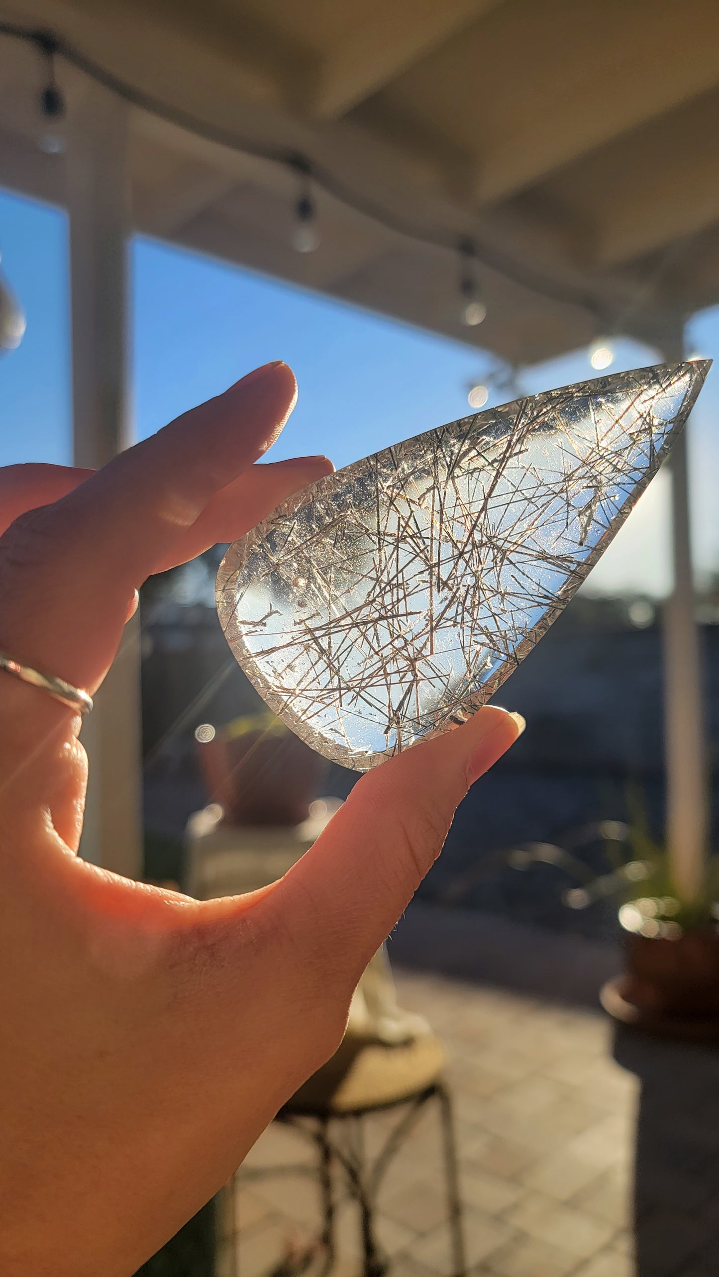 Giant tourmalinated quartz cabochon